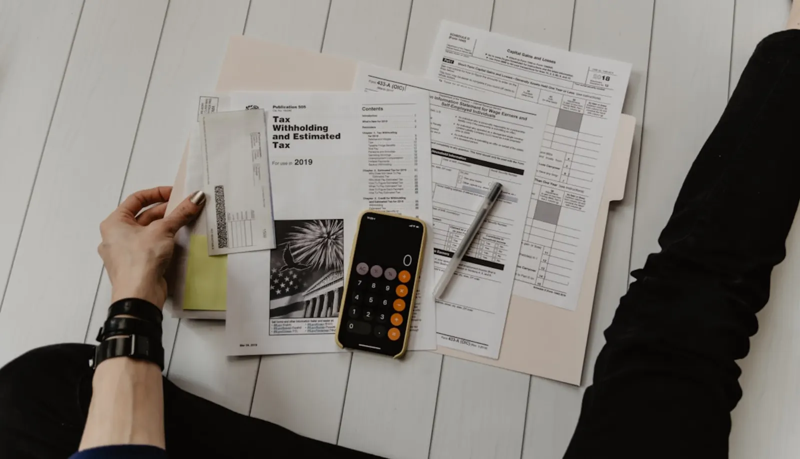 IRS tax forms and paperwork on a desk